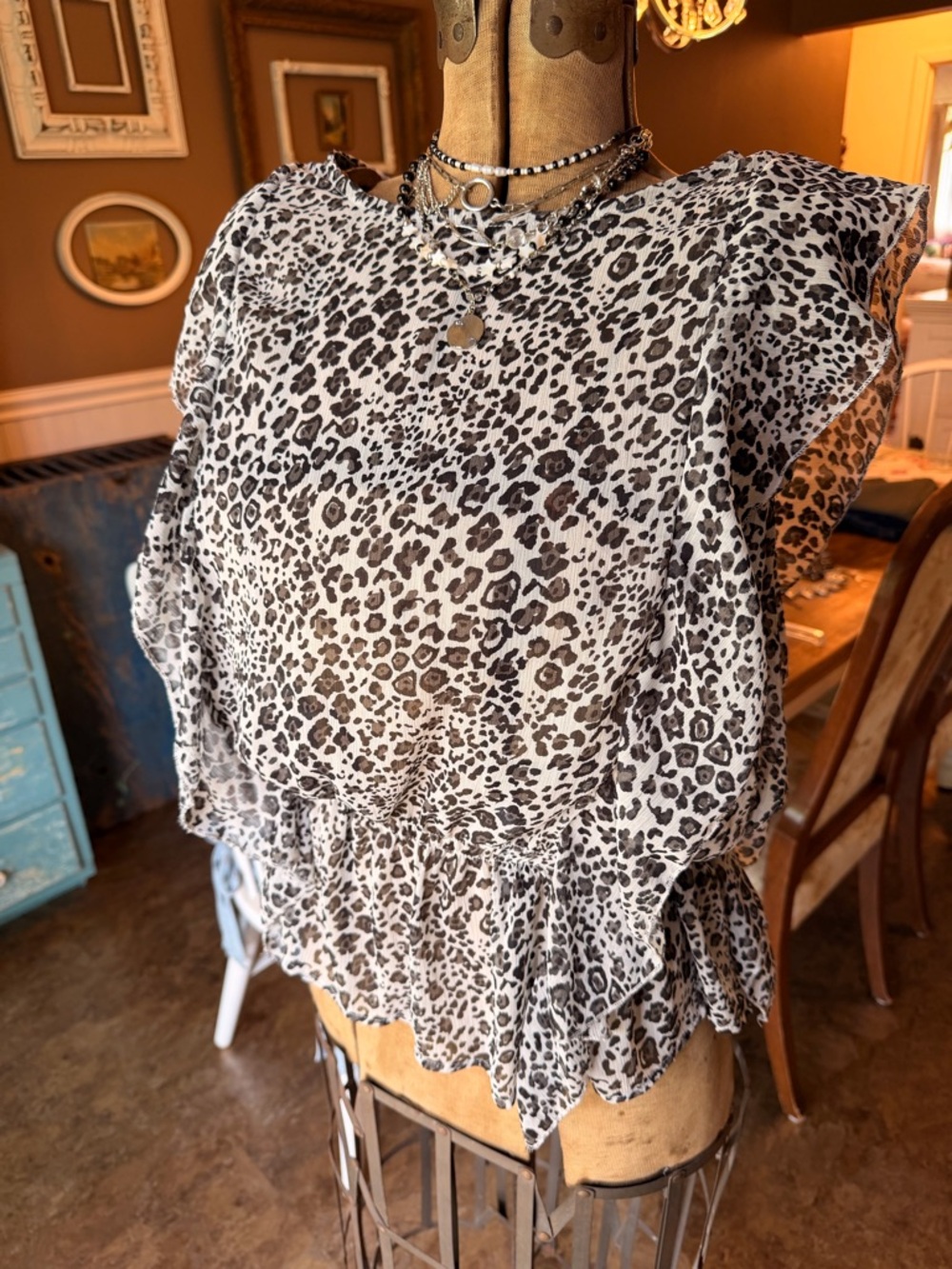 Leopard Print Ruffle Peplum Sleeveless Blouse
